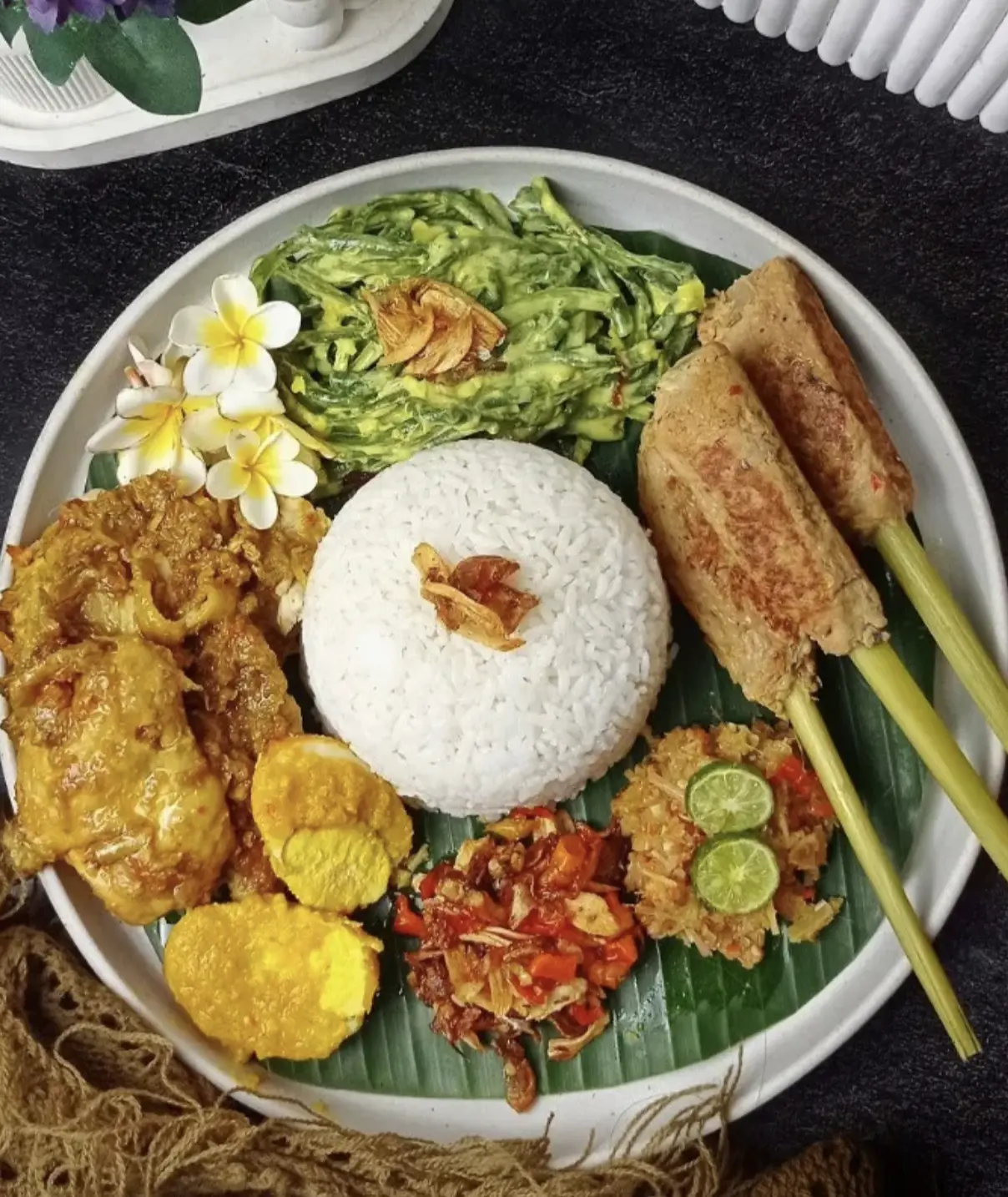 Nasi Campur Bali with traditional Balinese dishes