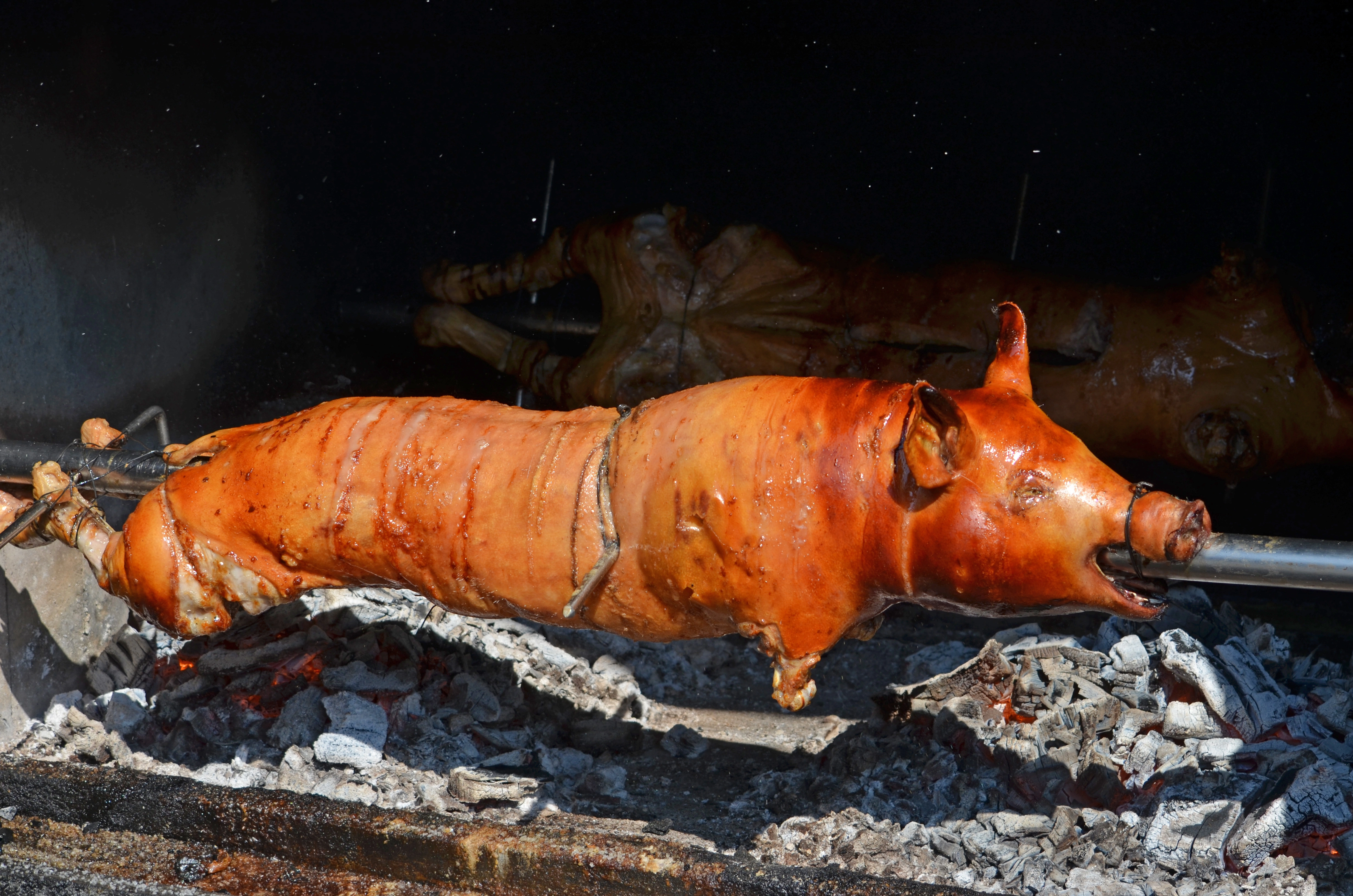 Babi Guling served with rice and traditional Balinese side dishes